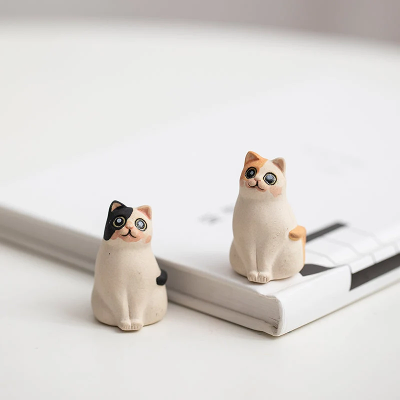 Mascottes de thé chat innocent