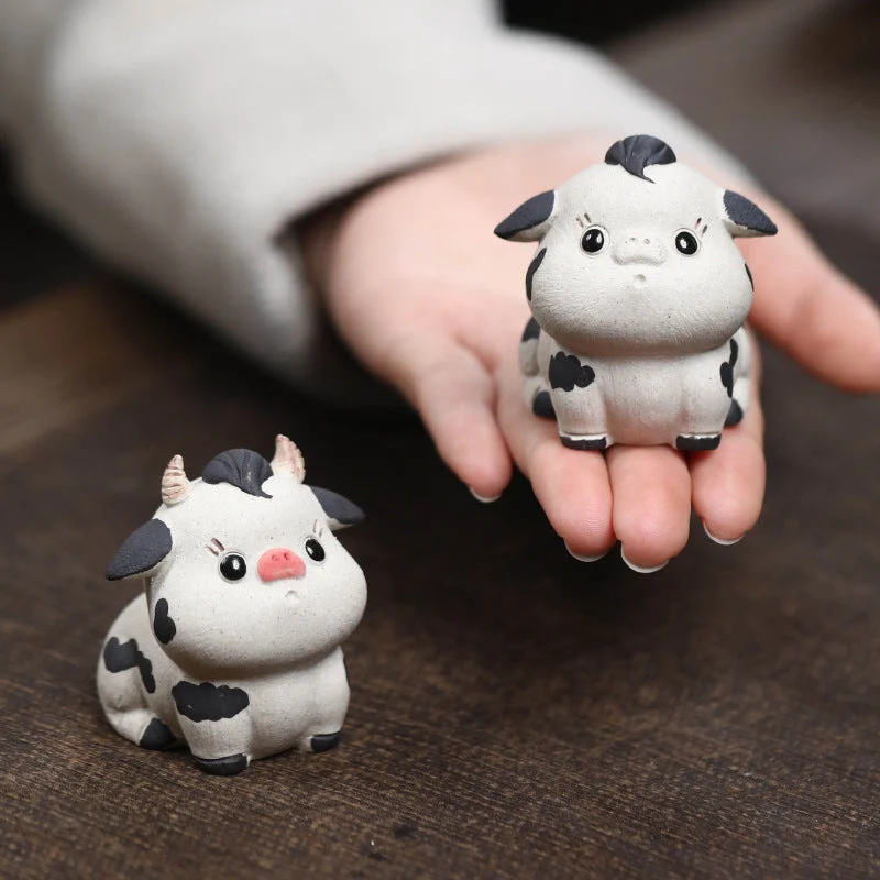 Mascottes de thé vache cute en argile