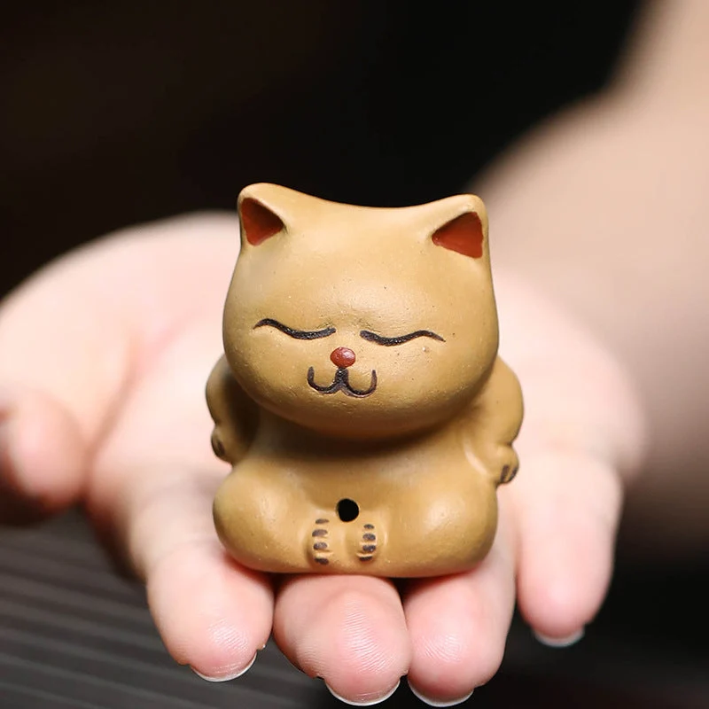 Mascottes de thé chat dormant en argile