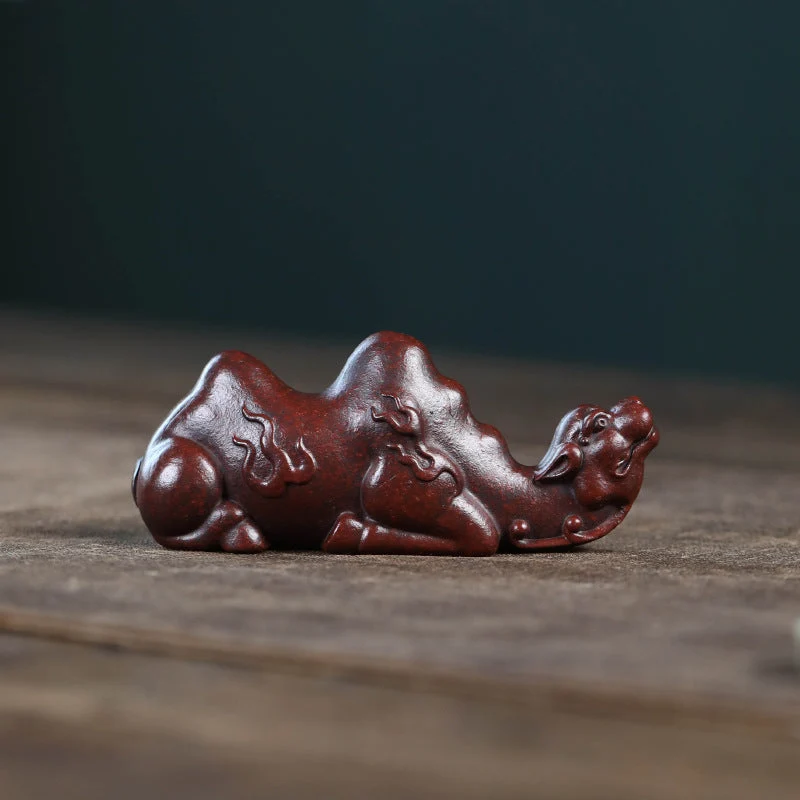 Mascottes de thé posson rouge en argile