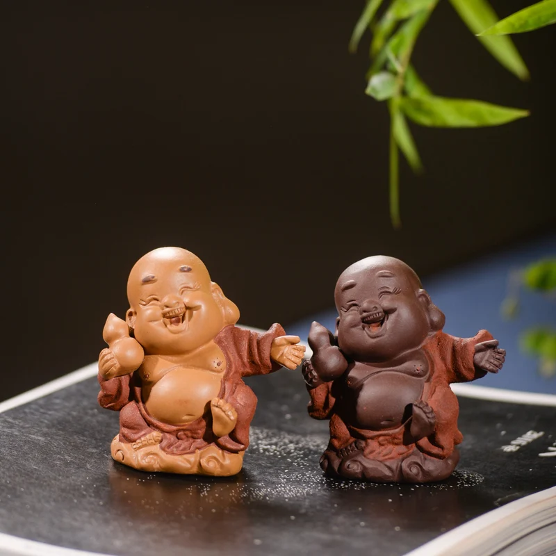 Mascottes de thé bébé zen en argile