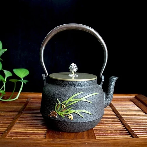 THÉIÈRE EN FONTE ORCHIDÉE (ANCIENNE)
