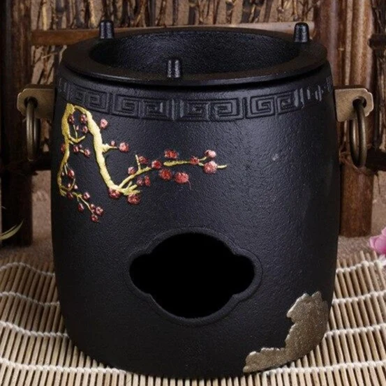 Chauffe Théière en Fonte